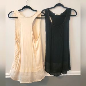 2 Large Origami racerback tunics with satin accents.